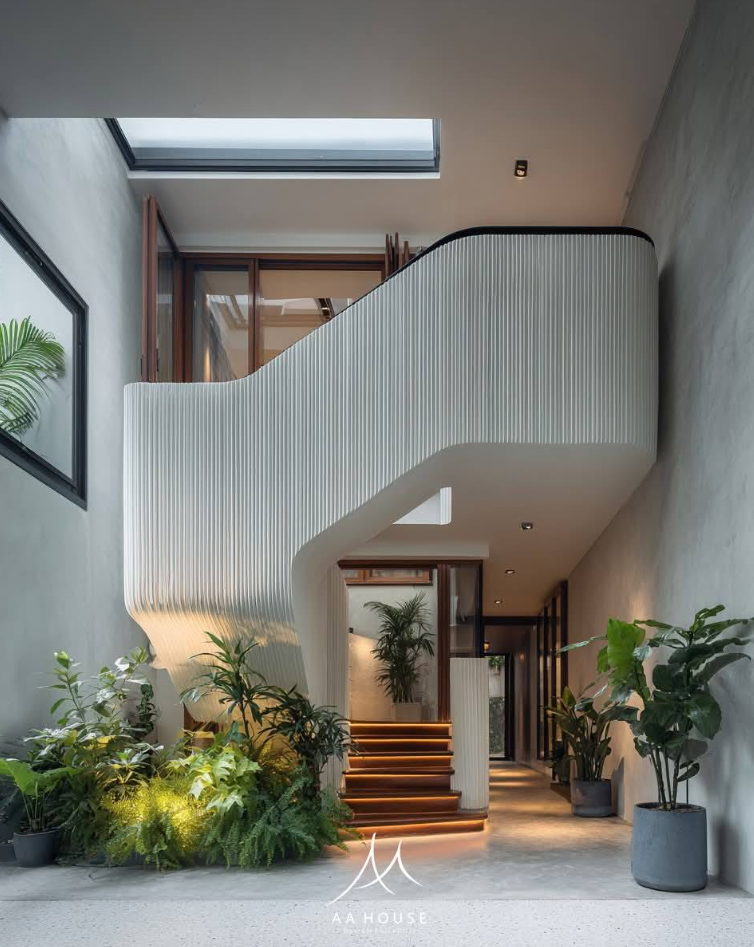 Nhà chữ L Tây Ninh: Mặt ngoài bê tông bên trong kiên cố, bên trong khoảng rỗng đôi ôm trọn thiên nhiên- Ảnh 4. Nhà chữ L Tây Ninh: Mặt ngoài bê tông bên trong kiên cố, bên trong khoảng rỗng đôi ôm trọn thiên nhiên- Ảnh 4.