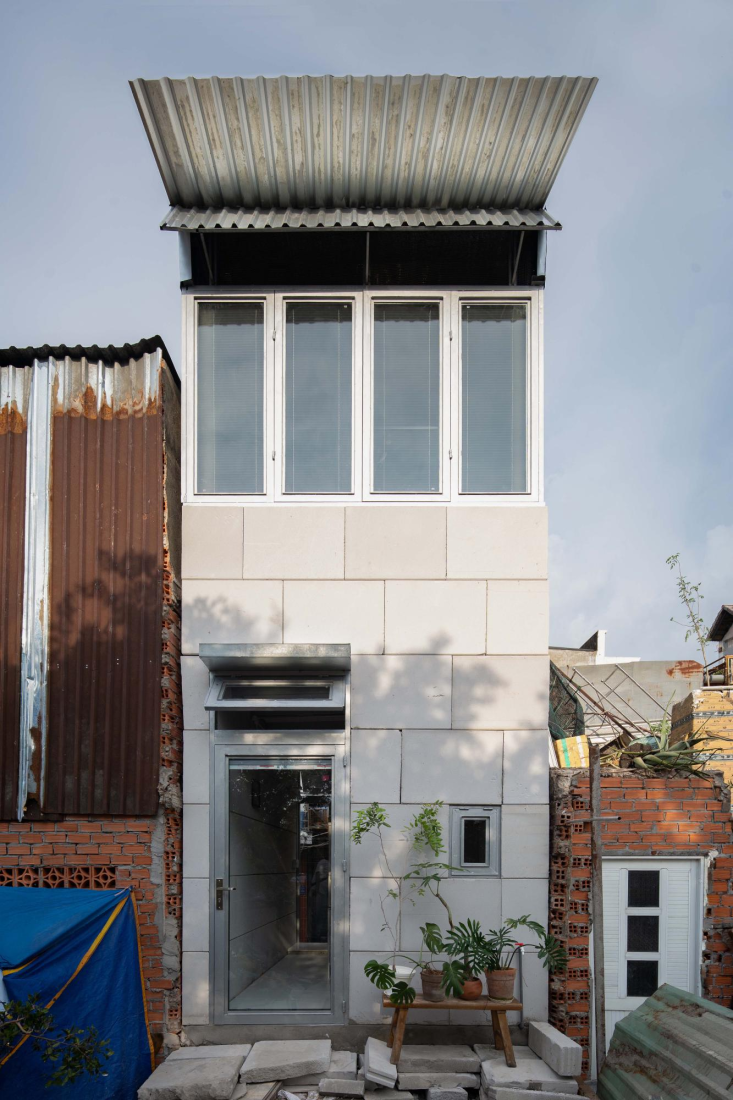 Thiết kế nhà siêu nhỏ 11m2 TP.HCM: Ứng dụng vật liệu nhẹ cho không gian tối giản- Ảnh 1.