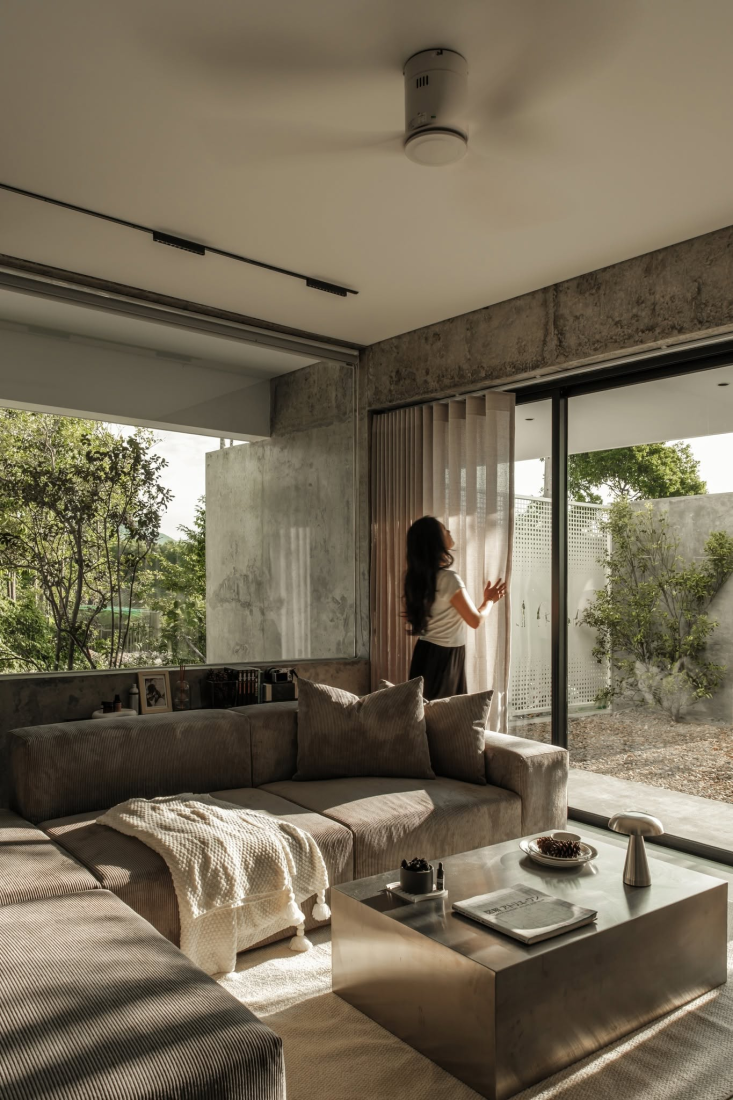 Nhà hướng Tây 102m² tại Huế: Lõi cầu thang mặt tiền và vật liệu bản địa làm mát tự nhiên- Ảnh 11.
