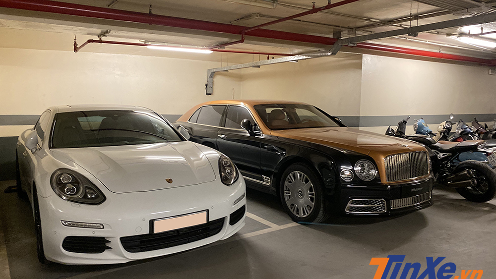 Cặp đ&ocirc;i Bentley Mulsane v&agrave; Porsche Panamera của một nữ doanh nh&acirc;n xinh đẹp tại H&agrave; Nội cũng tr&uacute; ngụ tại hầm gửi xe n&agrave;y.