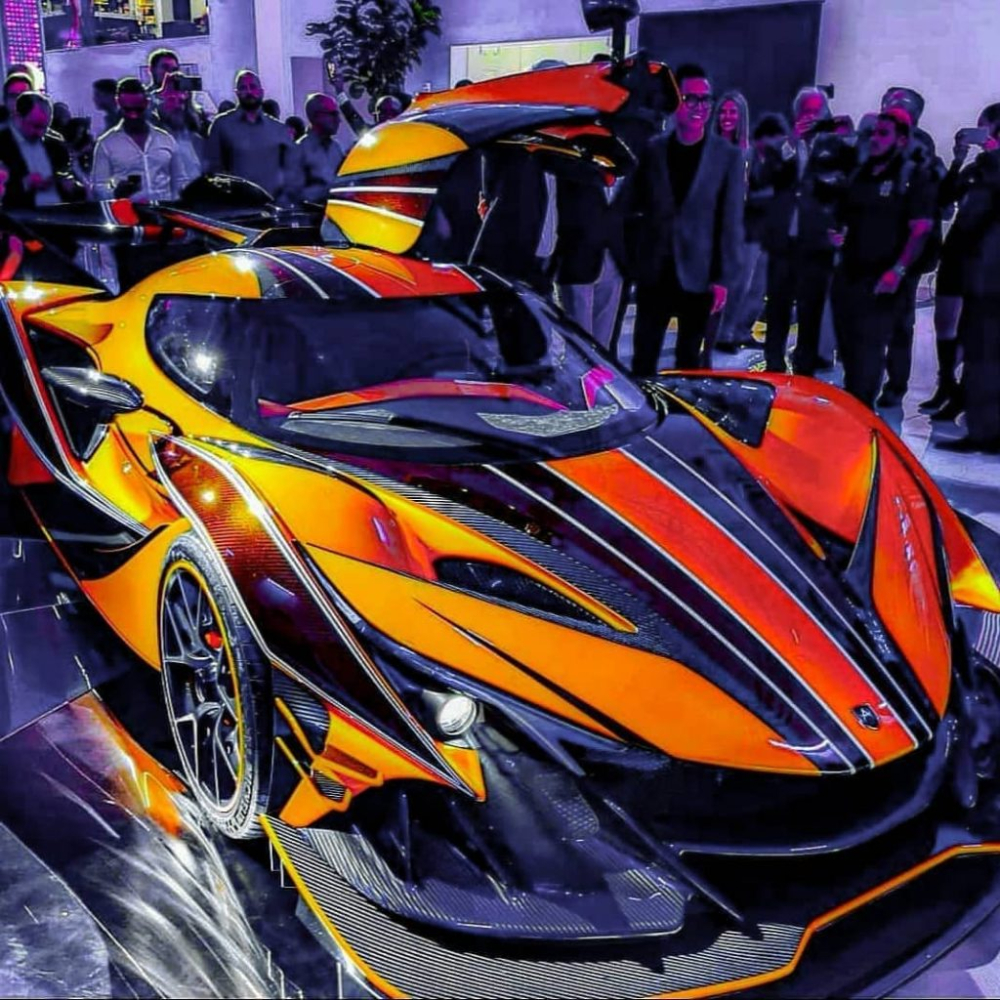 Sau chiếc siêu xe Apollo Intensa Emozione Sau chiếc siêu xe Apollo Intensa Emozione Golden Dragon của một đại gia Malaysia mua, chiếc Apollo Intensa Emozione thứ 2 đã lộ diện với tên gọi Orange Dragon. Nghe cái tên cũng rõ chiếc siêu xe Apollo Intensa Emozione Orange Dragon có ngoại thất sơn màu cam rực rất nổi bật.