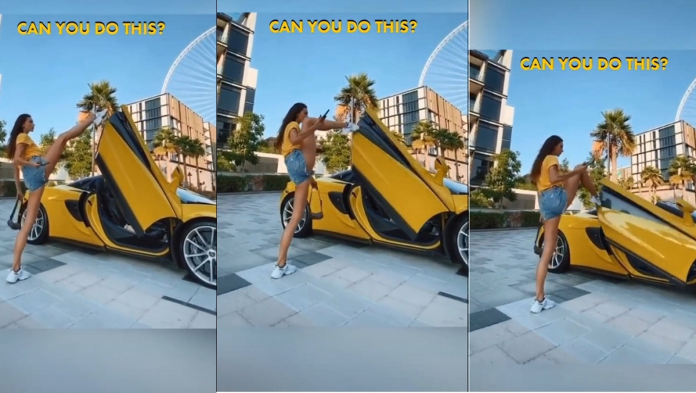 Hot girl d&ugrave;ng ch&acirc;n đ&oacute;ng cửa si&ecirc;u xe McLaren 570S Spider m&agrave;u v&agrave;ng