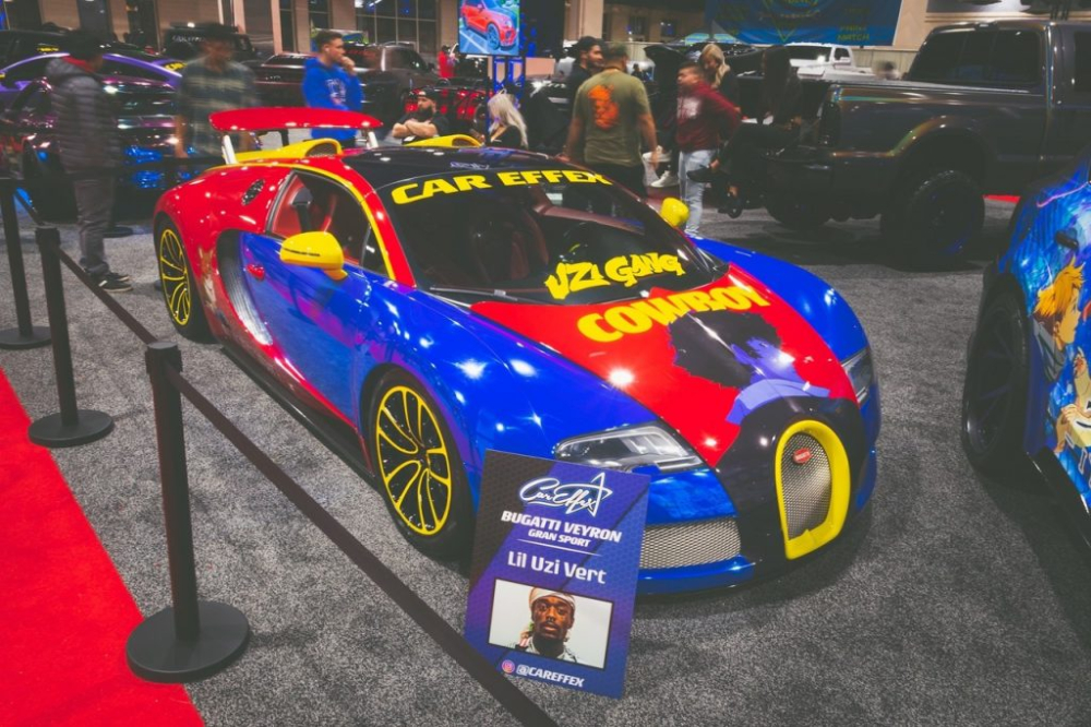Rapper Lil Uzi Vert đã mang chiếc Bugatti Veyron Grand Sport tham dự một sự kiện xe độ độc đáo và gây bất ngờ cho không ít khách tham quan. Rapper Lil Uzi Vert đã mang chiếc Bugatti Veyron Grand Sport tham dự một sự kiện xe độ độc đáo và gây bất ngờ cho không ít khách tham quan.