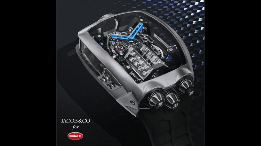Khối động cơ W16 của Bugatti Chiron được thu nhỏ lại và đặt bên trong chiếc đồng hồ. Khối động cơ W16 của Bugatti Chiron được thu nhỏ lại và đặt bên trong chiếc đồng hồ.