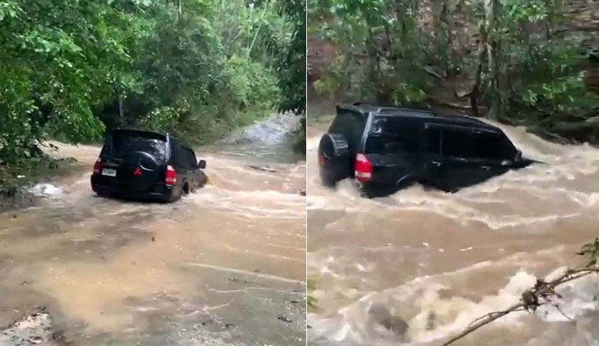 Mitsubishi Pajero bị nước sông cuốn đi