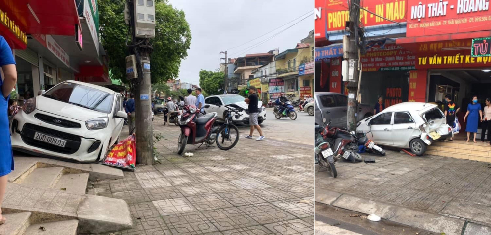 Chiếc Kia Morning t&ocirc;ng tr&uacute;ng 2 chiếc xe m&aacute;y v&agrave; 2 chiếc xe đạp điện dựng tr&ecirc;n vỉa h&egrave;