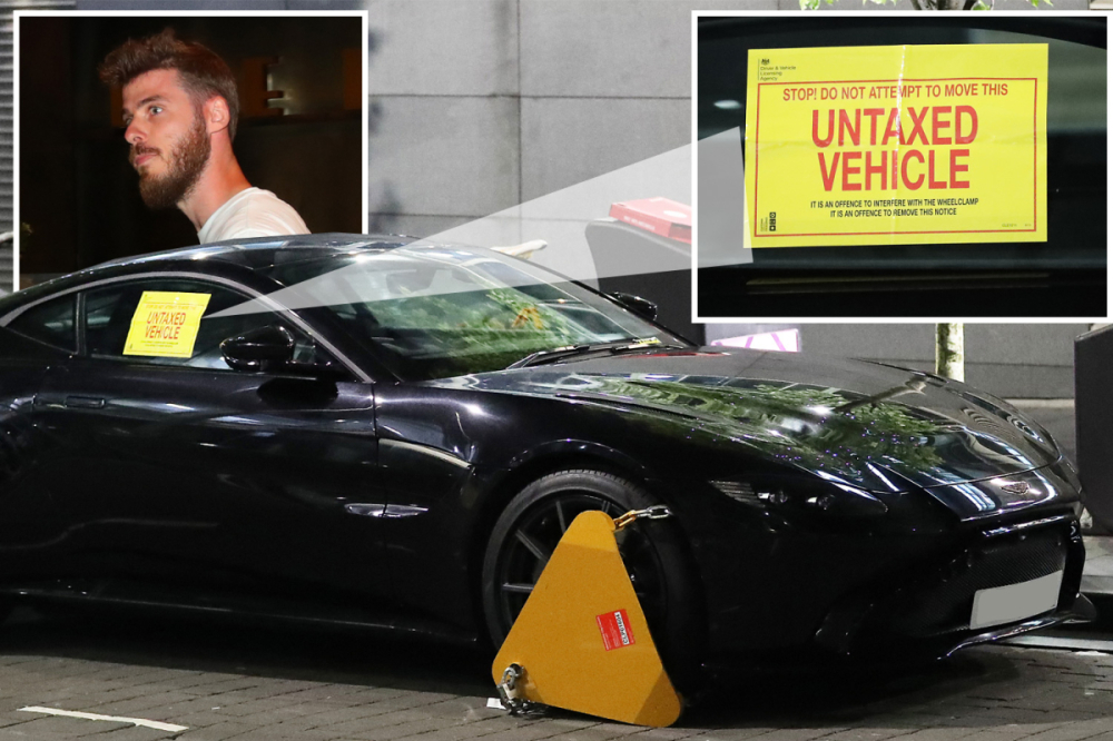 Hình ảnh chiếc xe thể thao hạng sang của De Gea bị cảnh sát khóa bánh và thông báo chưa đóng thuế