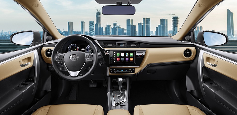 Nội thất bên trong Toyota Corolla Altis mặc dù được bổ sung nhiều tiện nghi nhưng vẫn đơn điệu.
