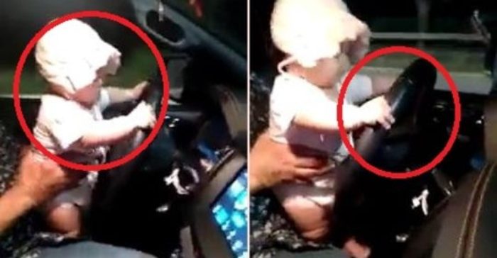Không được phép để trẻ em ngồi trong lòng người lái khi xe di chuyển