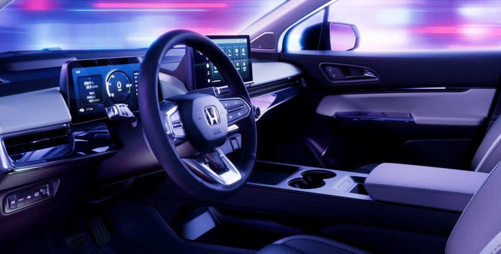 Nút chọn phanh tay điện tử và tự động giữ phanh tạm thời của Honda Prologue 2024 nằm dưới cửa gió điều hòa bên trái Nút chọn phanh tay điện tử và tự động giữ phanh tạm thời của Honda Prologue 2024 nằm dưới cửa gió điều hòa bên trái