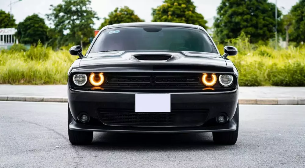 Chán Porsche 911, vận động viên thể hình Đắk Lắk trải nghiệm xe cơ bắp Dodge Challenger GT- Ảnh 1. Chán Porsche 911, vận động viên thể hình Đắk Lắk trải nghiệm xe cơ bắp Dodge Challenger GT- Ảnh 1.