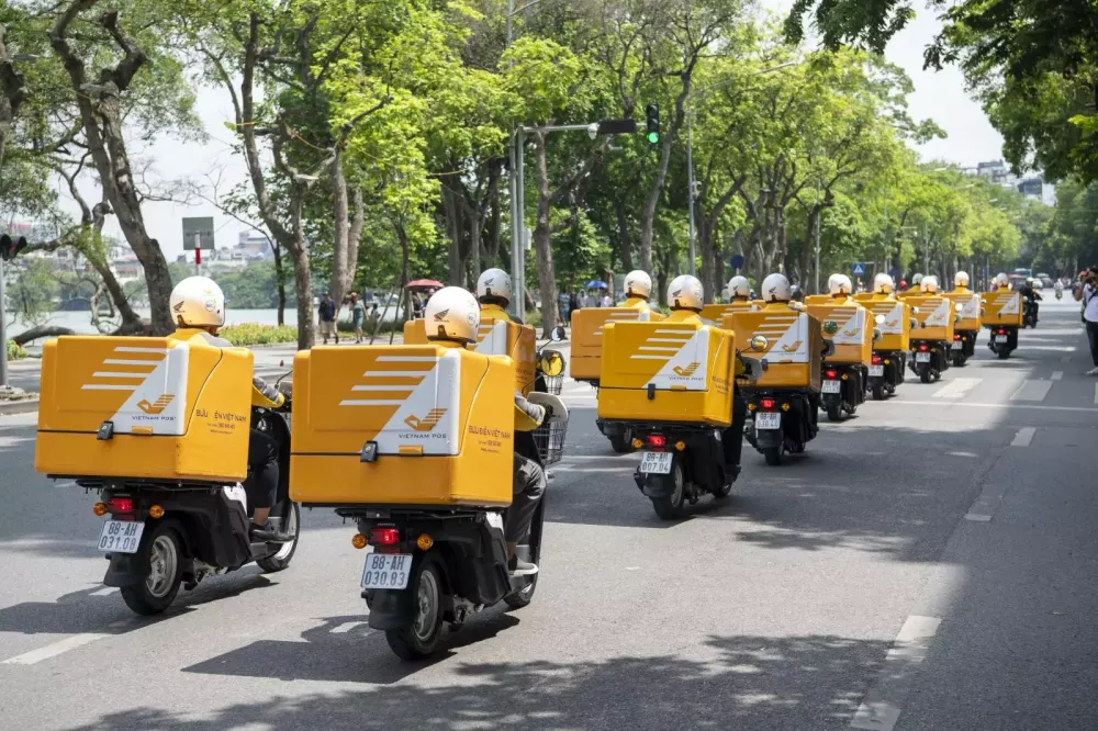 Honda bàn giao 205 xe điện Honda Benly e: cho Bưu điện Việt Nam- Ảnh 3. Honda bàn giao 205 xe điện Honda Benly e: cho Bưu điện Việt Nam- Ảnh 3.