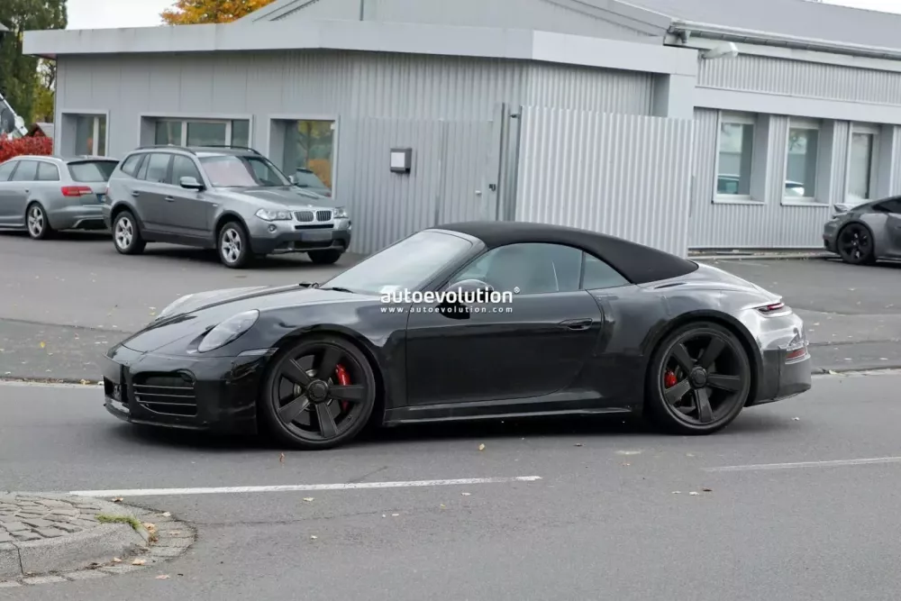 Đây có thể là Porsche 911 Turbo Touring Cabriolet 2026?- Ảnh 2. Đây có thể là Porsche 911 Turbo Touring Cabriolet 2026?- Ảnh 2.
