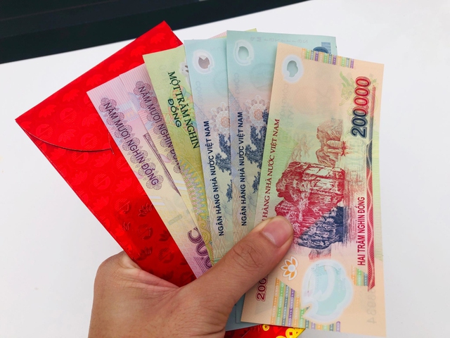 M&ugrave;ng 3 Tết, chị d&acirc;u lặng lẽ trả lại phong bao l&igrave; x&igrave; v&agrave; n&oacute;i một c&acirc;u khiến t&ocirc;i &aacute;m ảnh- Ảnh 1.