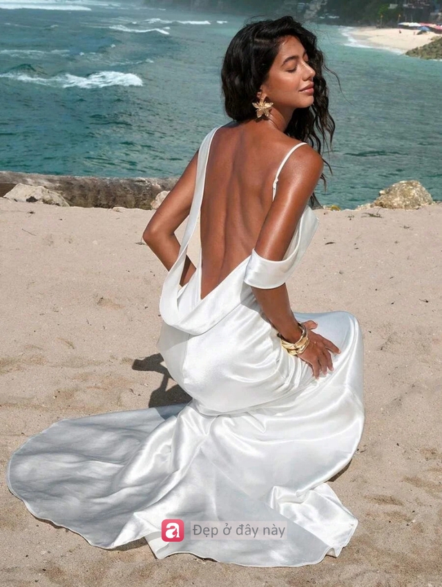 Vì sao váy trắng luôn là “quân bài đắt giá” khi đi biển? - Ảnh 2.