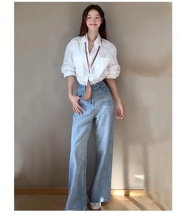 Quần jeans ống rộng vẫn là “vua” của tủ đồ năm 2026: 8 công thức phối đồ giúp bạn mặc đẹp, che khuyết điểm và trông sang hơn - Ảnh 7.