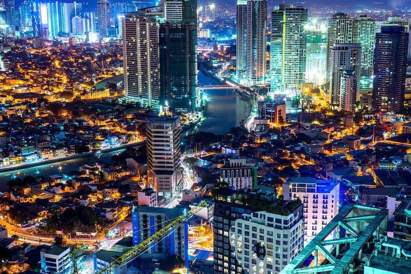 https://thanhnienviet.mediacdn.vn/wp-content/uploads/2022/12/Skyline-of-Manila-by-the-River-Pasig-min.jpg
