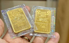 Vàng giảm, bán hay giữ?