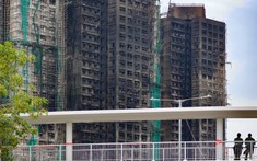 Lượt xem nhà đất tại Hong Kong giảm sau vụ cháy chung cư, giao dịch tạm lắng vì nỗi đau cộng đồng