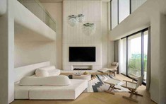 Cải tạo gộp 2 nhà phố liền kề TP.HCM: Cấu trúc thông tầng đôi và ngôn ngữ đường cong