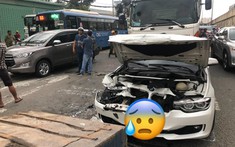 Quận 12: Tông xe dây chuyền trên Quốc lộ 1A, BMW bị kẹp giữa xe đầu kéo và xe tải