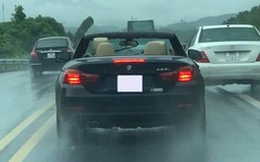 Để BMW 428i mui trần tắm mưa thoải mái, cư dân mạng phán dân chơi không sợ mưa rơi là có thật
