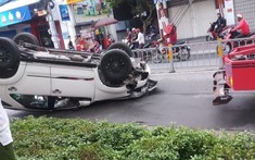 Sài Gòn: "Thánh lật" Toyota Fortuner ngửa bụng giữa đường lúc sáng sớm