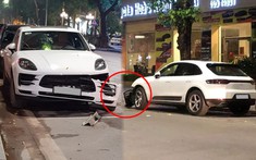 Hà Nội: Porsche Macan hơn 3,1 tỷ đồng đỗ trên đường bị xe khác va quẹt khiến cản va trước bung ra