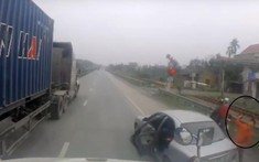 Video: Ô tô con tạt đầu, chặn xe và ném gạch vỡ kính xe container trên quốc lộ 5