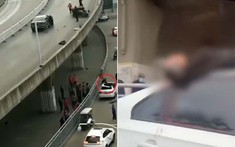 Sau va chạm trên cầu vượt, người lái xe 3 bánh rơi xuống bên dưới, trúng nóc một chiếc ô tô
