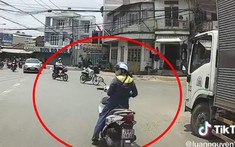 Video: Cô gái dừng xe Honda Vision giữa đường bấm điện thoại ngay khúc cua khiến tài xế xe tải phanh gấp