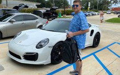 Người đàn ông mua xe sang Porsche 911 Turbo trị giá 140.000 USD bằng tấm séc... in tại nhà