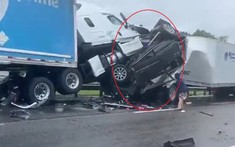 SUV cỡ lớn bị kẹp nát giữa 2 xe đầu kéo trong vụ 7 ô tô đâm liên hoàn