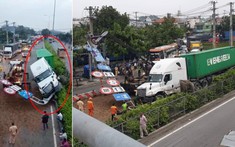 Thủ Đức: Xe container mất lái lao lên dải phân cách tông đổ cột biển báo giao thông