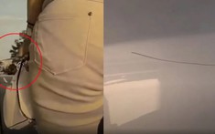 Chế độ chống trộm "vạch mặt" người phụ nữ đi Toyota Camry, dùng dao làm xước sơn xe Tesla Model Y