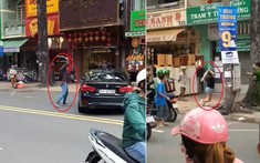 Video: Thanh niên dùng gậy sắt đập ô tô BMW, bị nữ tài xế lái xe đuổi vòng vòng trên đường Sài Gòn
