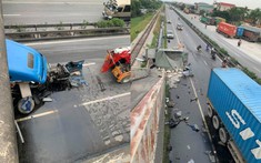 Hải Dương: Xe container tông đuôi ô tô tải chở xi măng, 2 tài xế nhập viện