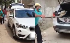 Người đàn ông dùng BMW X1 làm xe chở rác để bày tỏ sự bức xúc với dịch vụ của đại lý