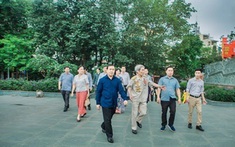 Trung tá Nguyễn Cao Phong – Cựu cán bộ cấp cao Quân tình nguyện Việt Nam tại Lào chúc Tết cổ truyền Bun-pi-may tại Hà Nội