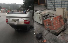 Quảng Ninh: Xe sang Audi tông vào tủ điện trên vỉa hè rồi "ngửa bụng"