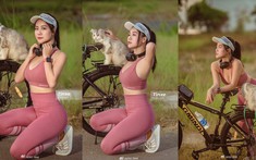 Nữ gymer khoe dáng khoẻ khoắn bên xe đạp thể thao