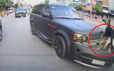 Video: Tài xế chuyển làn không xi-nhan, xe Range Rover bị thanh niên chạy xe máy tông bay cản va trước