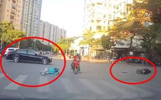 Khoảnh khắc xe Mercedes-Benz tông trúng thanh niên chạy xe máy vượt đèn đỏ ở Hà Nội