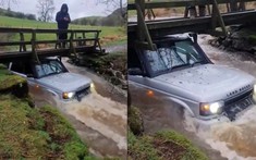 Hội chơi Land Rover Defender mang xe "về quê" để off-road, một chiếc mắc kẹt dưới cây cầu bắc qua suối
