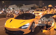 Video: Cô gái tăng tốc siêu xe McLaren 720S sau khi kiểm tra nồng độ cồn ở Sài thành
