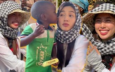 Thùy Tiên đỏ mặt khi được cậu bé Angola thơm má sau màn song ca liên khúc nhạc thiếu nhi cực đáng yêu