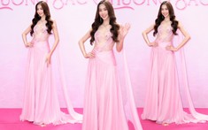 Chọn tone hồng tưởng chừng nhẹ nhàng, Thùy Tiên 'chặt đẹp' hội chị em trên thảm đỏ Hoa hậu Việt Nam 2022
