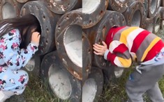 Xúi giục trẻ em thử nghiệm chui đầu vào trụ bê tông, nam TikToker bị lên án kịch liệt