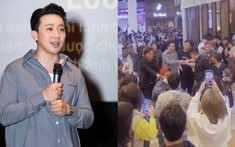 Fan vây kín xin bắt tay lại bị bảo vệ ngăn cản, Trấn Thành phản ứng ra sao?