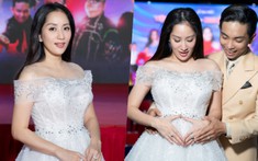 Khánh Thi mặc đầm công chúa, giấu bụng bầu trong ngày lên chức Viện trưởng